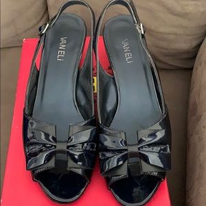 van eli paten leather wedge shoe.